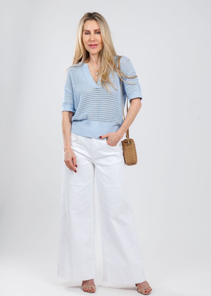Varley Callie Knit Top in Cashmere Blue paired with MAC Nevada Superwide Jeans in White, Clare V Midi Sac Crossbody Bag in Clay Leather & Suede Woven Checker available at Barbara Katz