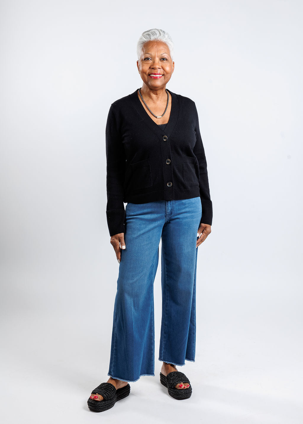 Whisper by Brodie Tiffany Floral Pointelle Back Cardigan in Coal paired with MAC Dream Wide Crop Wonder Jeans in Denim available at Barbara Katz