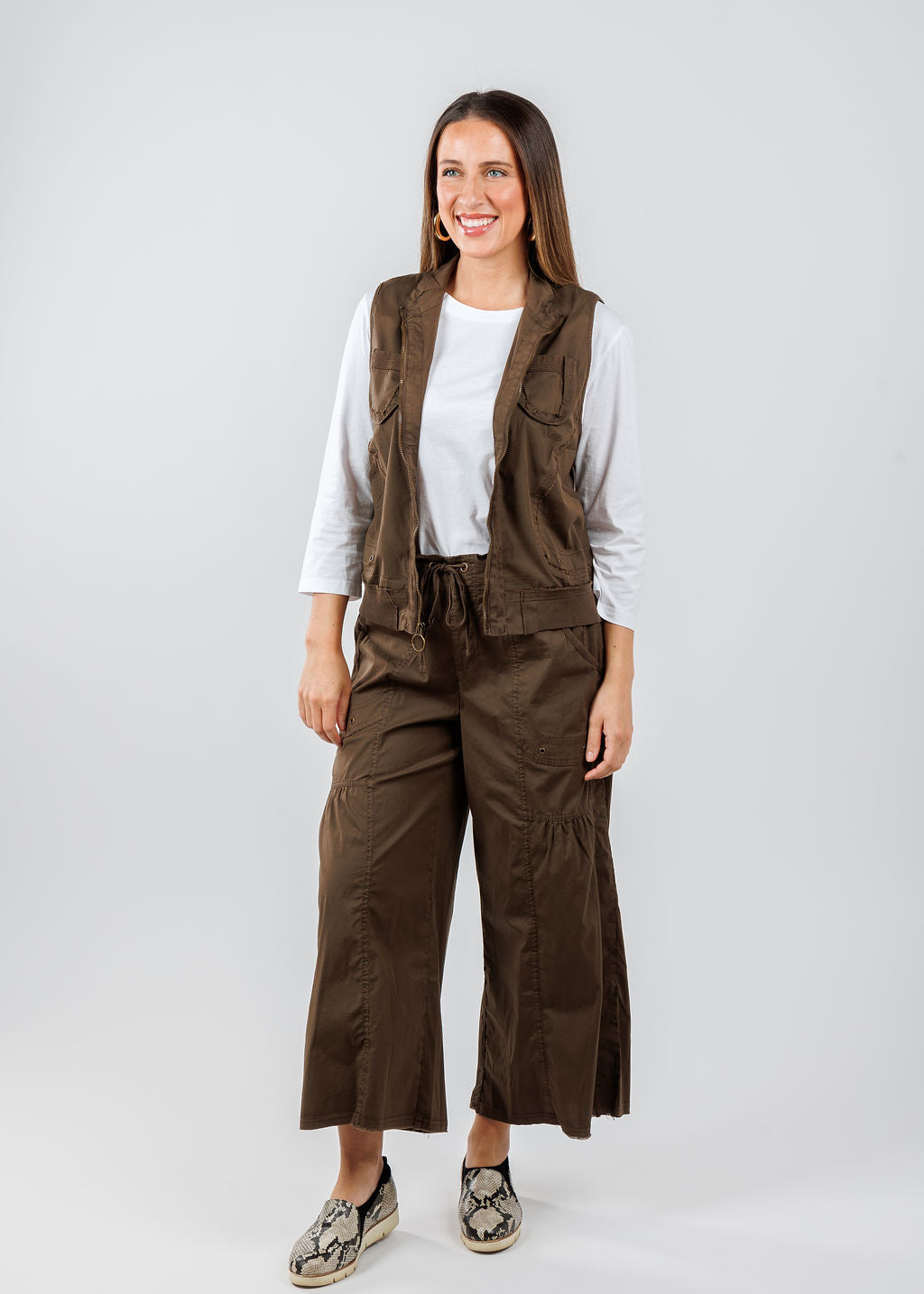 XCVI Grindelle Vest in Westgate paired with Pure Amici 3/4 Sleeve Crew Tee in White and XCVI Seaver Gaucho Pants in Westgate available at Barbara Katz