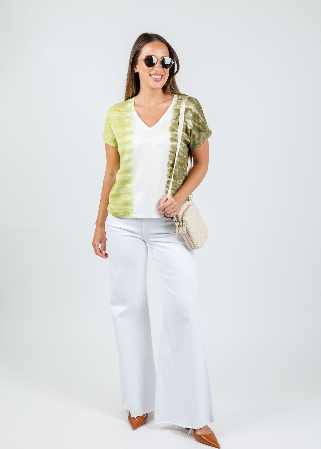 XCVI Ulysses V Neck Top in Aeriel Wash Vineyard paired with Pistola Izzy Wide Leg Jeans in White available at Barbara Katz