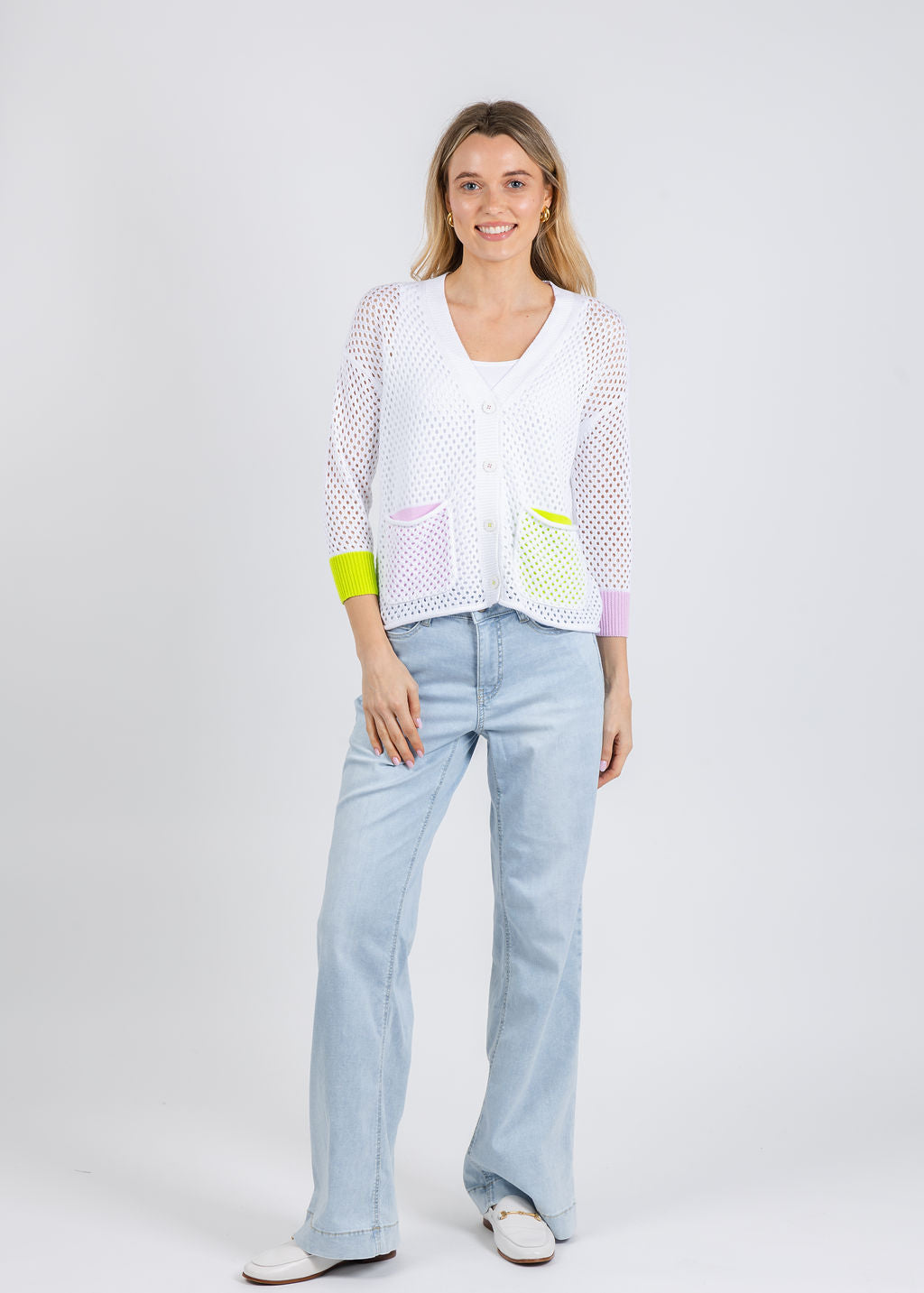 Zaket & Plover Holey Pocket Cardigan in White paired with MAC Dream Wide Wonderlight Jeans 32" in Light Azure Blue available at Barbara Katz