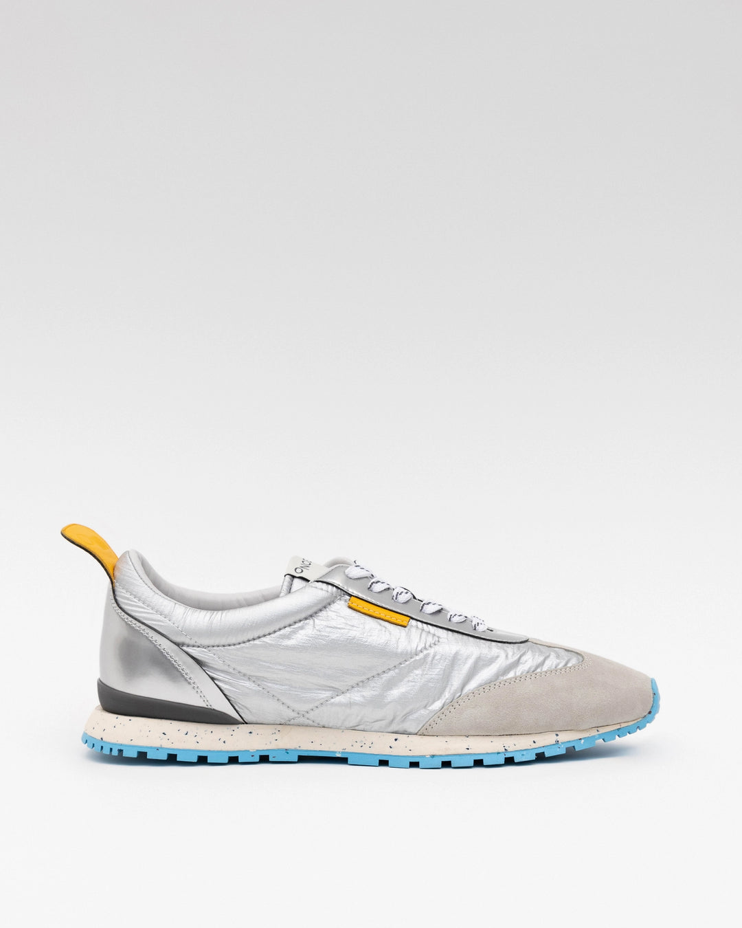Oncept - Tokyo Sneaker in metallic is a great addition to your everyday sneaker collection. These sustainable water resistant nylon, chrome free suede, re-speckled midsole and tencel twill linings add the conscious effort to your wardrobe 
