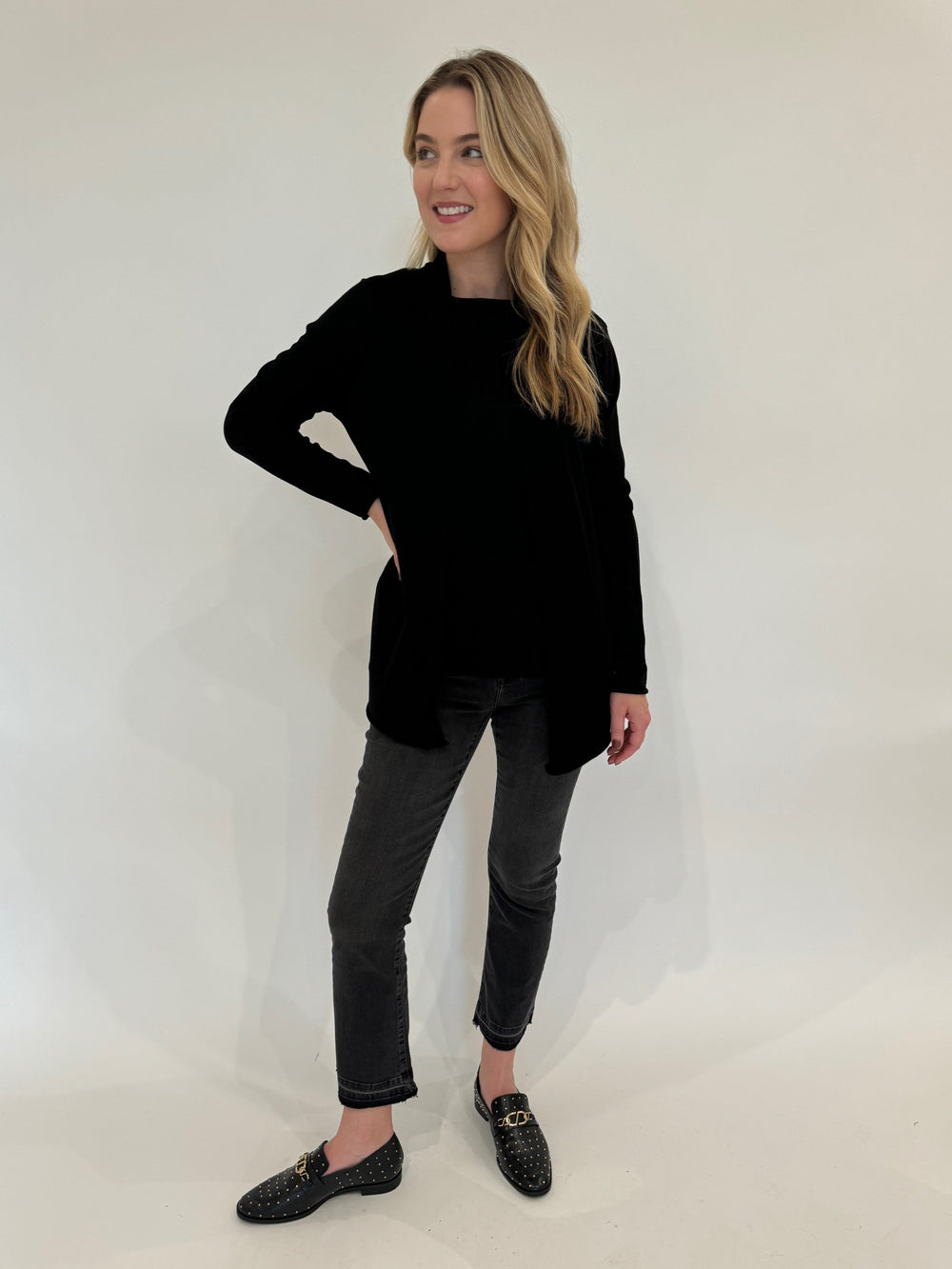 BK Stella Roll Crew Neck Sweater and Olivia Long Open Cardigan in Black paired with Elliott Lauren Bootcut Jeans with Shadow Hem
in Washed Black available at Barbara Katz