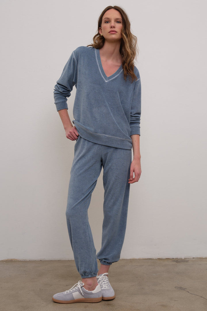 Goldie Life of Luxury Terry Flare Pants in Faded Denim available at Barbara Katz