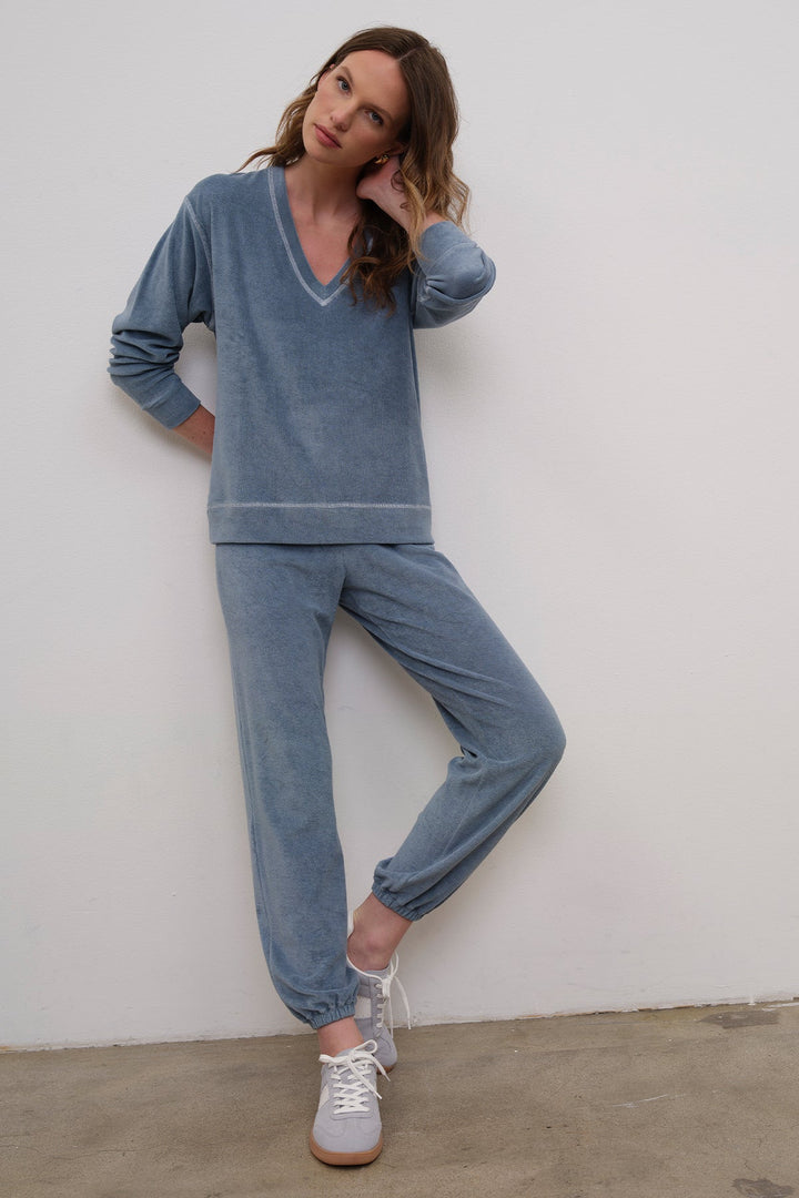 Goldie Life of Luxury Terry Flare Pants in Faded Denim available at Barbara Katz