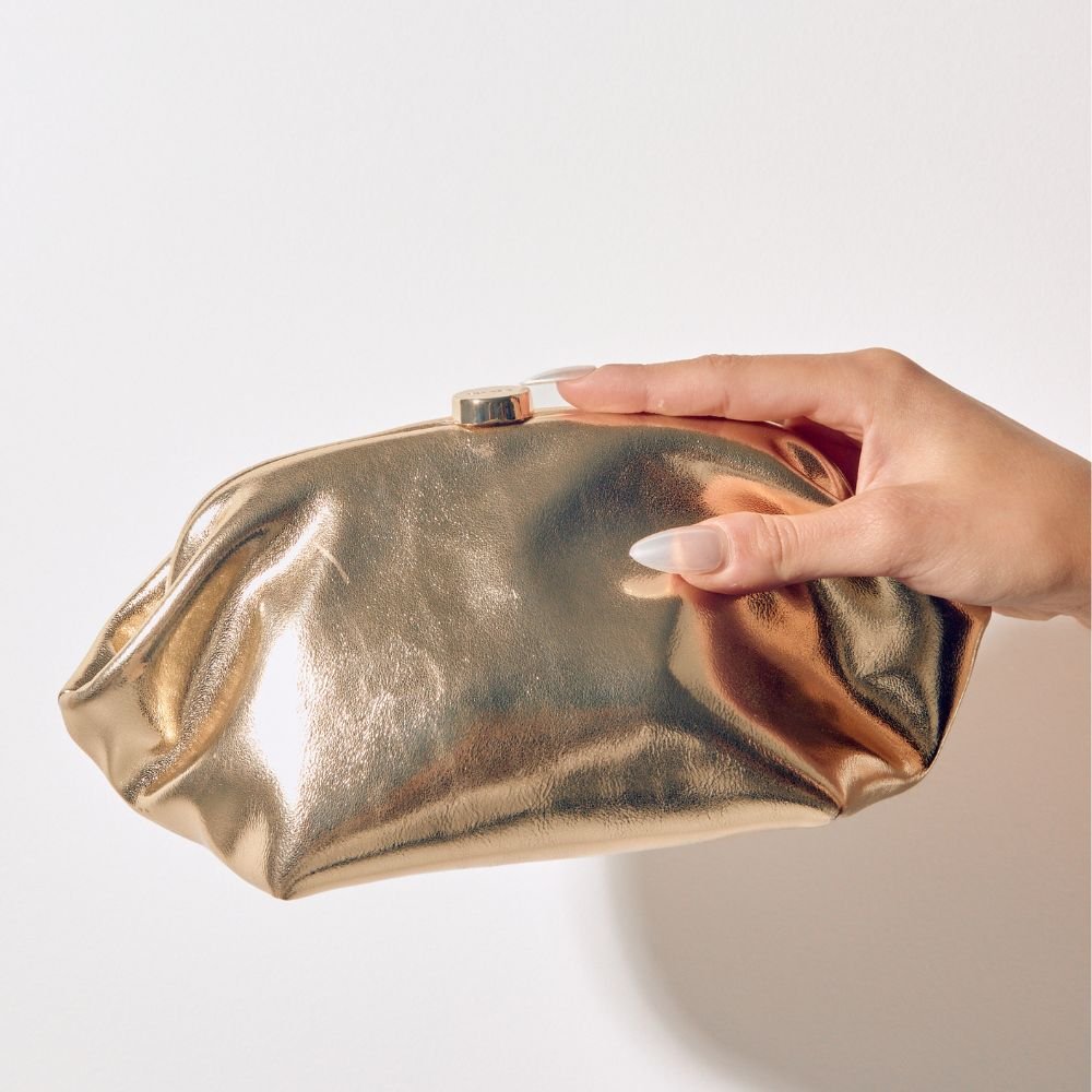 Olga Berg Tally Metallic Clutch in Gold available at Barbara Katz