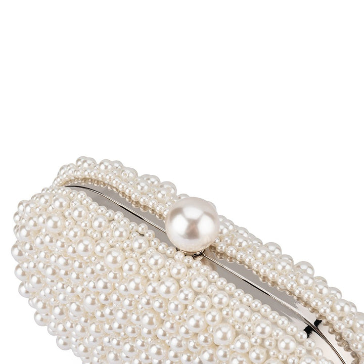 Olga Berg Valentina Pearl Clutch Bag in Pearl/Silver available at Barbara Katz