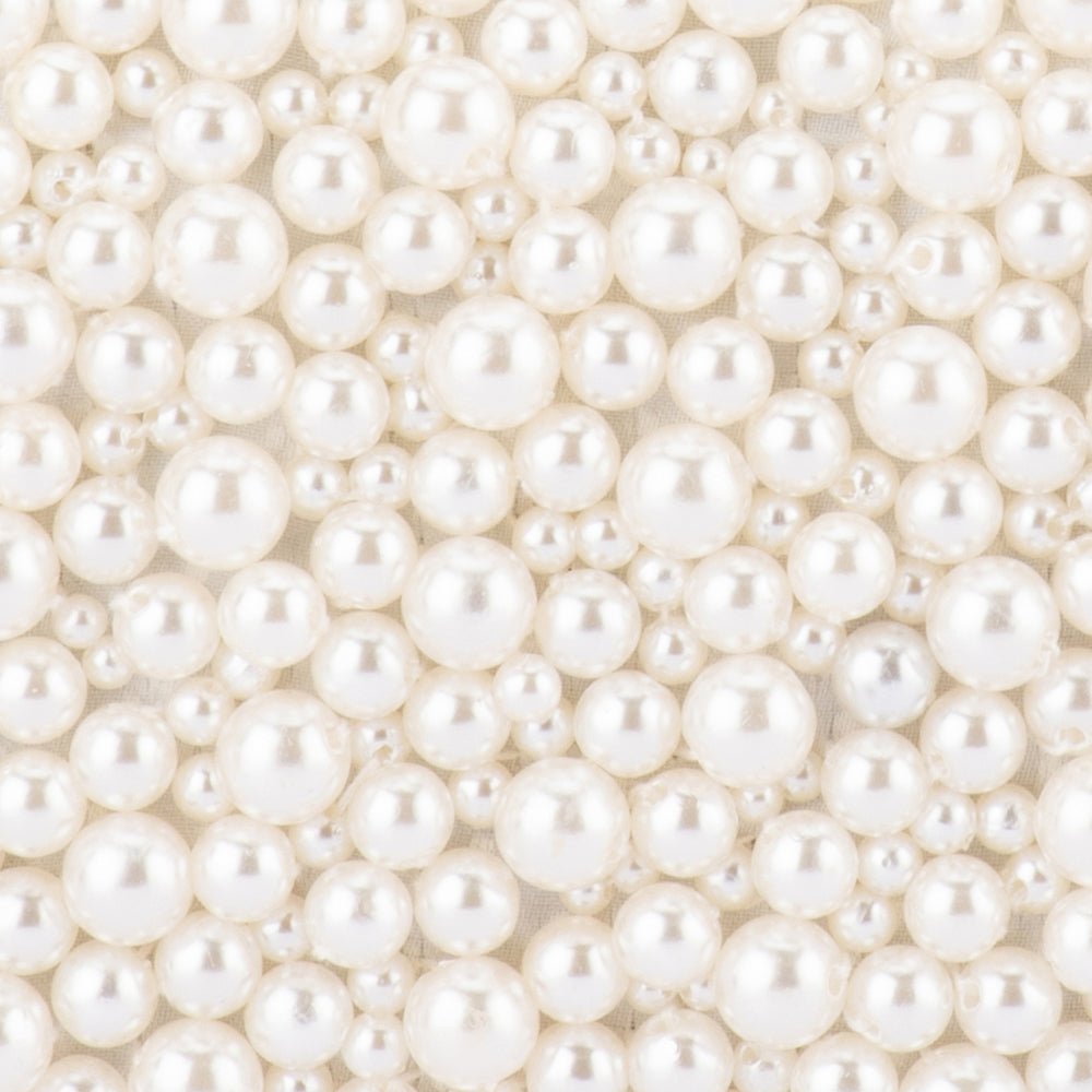 Olga Berg Valentina Pearl Clutch Bag in Pearl/Silver available at Barbara Katz