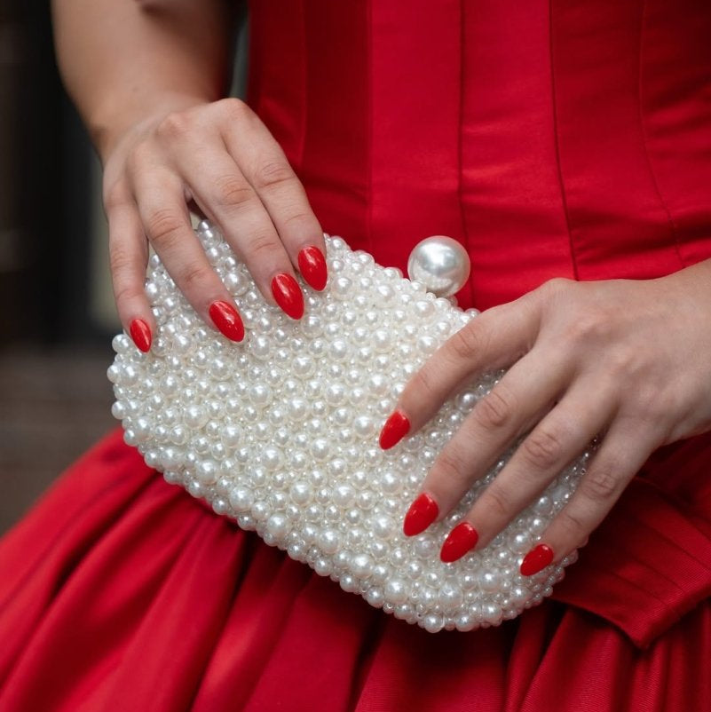 Olga Berg Valentina Pearl Clutch Bag in Pearl/Silver available at Barbara Katz