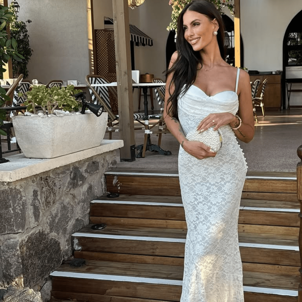 Olga Berg Valentina Pearl Clutch Bag in Pearl/Silver available at Barbara Katz