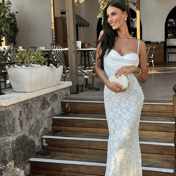 Olga Berg Valentina Pearl Clutch Bag in Pearl/Silver available at Barbara Katz