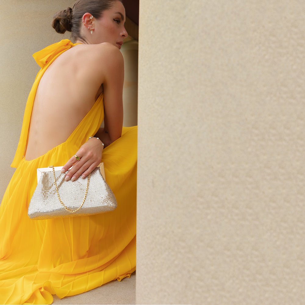 Olga Berg Zara Mesh Frame Clutch Bag in Gold available at Barbara Katz